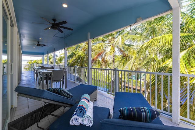 exterior space with an outdoor hangout area and ceiling fan