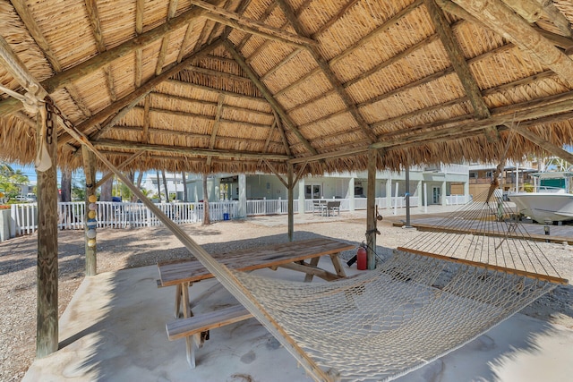 exterior space with a gazebo and fence