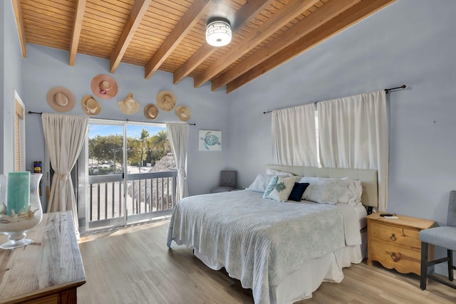 bedroom featuring wooden ceiling, access to outside, wood finished floors, and beam ceiling