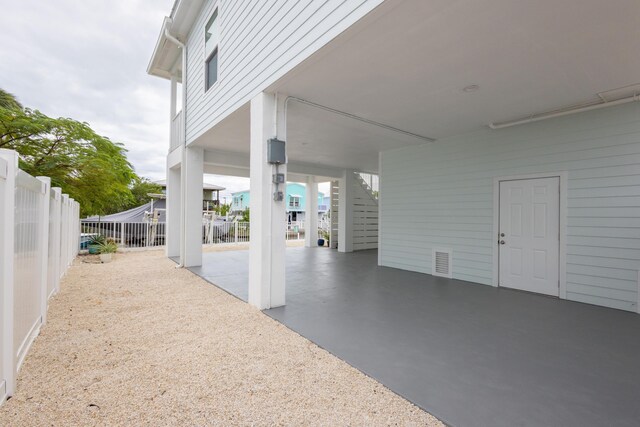 view of patio featuring a carport