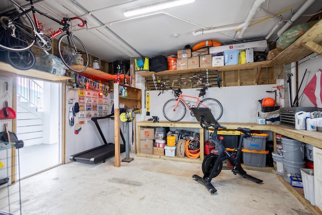 garage with a workshop area