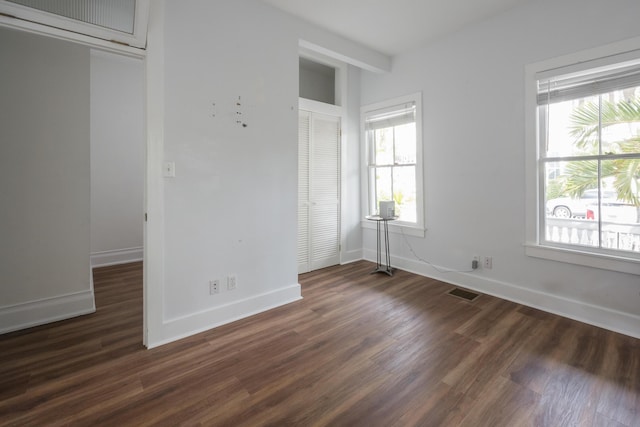 1210 Virginia St, Key West, FL 33040 - unfurnished room with dark wood-type flooring and baseboards