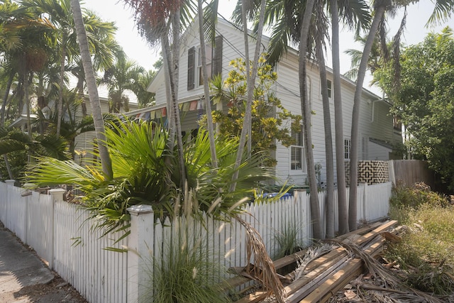 view of side of property with fence