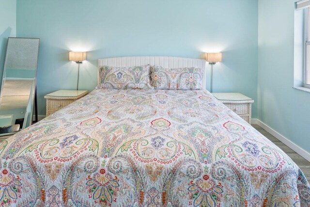 bedroom featuring hardwood / wood-style flooring