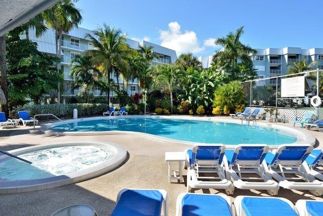 view of swimming pool with a patio