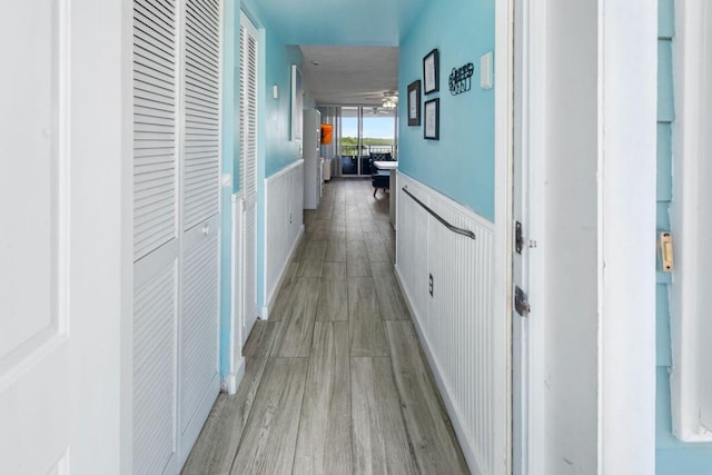 corridor featuring light hardwood / wood-style flooring