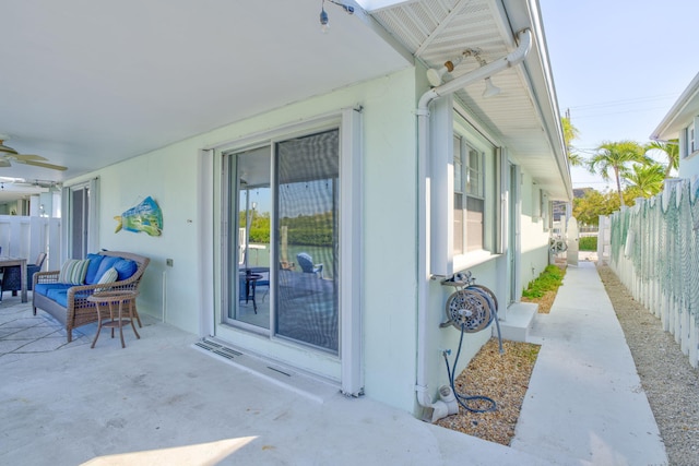 97 Coral Ln, Key Colony, FL 33051 - fenced backyard featuring a patio area and ceiling fan
