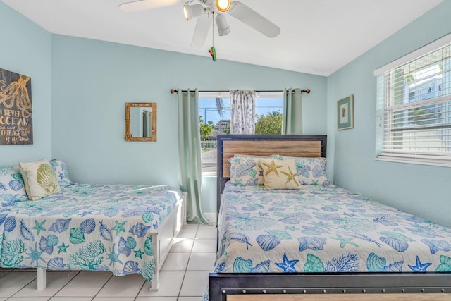 97 Coral Ln, Key Colony, FL 33051 - tiled bedroom with multiple windows, lofted ceiling, and a ceiling fan
