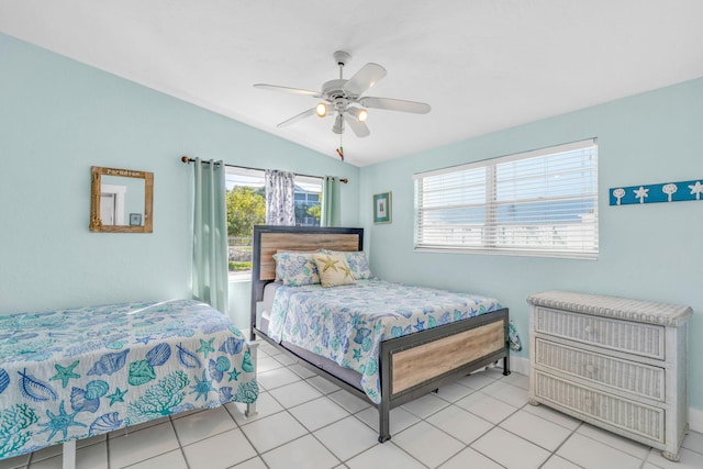 97 Coral Ln, Key Colony, FL 33051 - tiled bedroom with vaulted ceiling and a ceiling fan