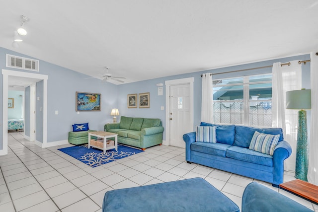 97 Coral Ln, Key Colony, FL 33051 - tiled living area featuring ceiling fan and baseboards