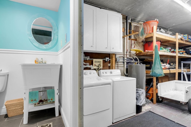 clothes washing area featuring washer and clothes dryer