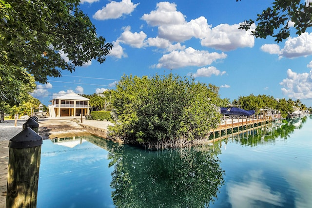 exterior space with a water view