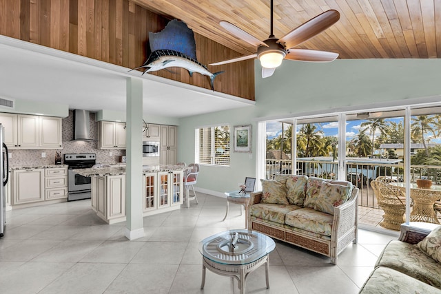 living room featuring light tile patterned floors, wood ceiling, high vaulted ceiling, and ceiling fan