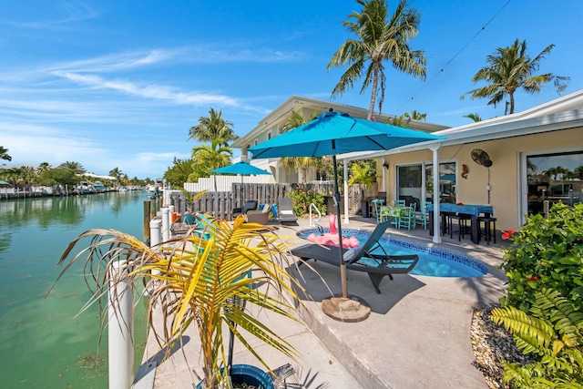 351 8th St, Key Colony, FL 33051 - view of pool with fence, a patio, and a water view