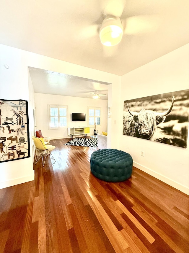 804 S St Unit 1, Key West, FL 33040 - living area with a ceiling fan, wood finished floors, and baseboards