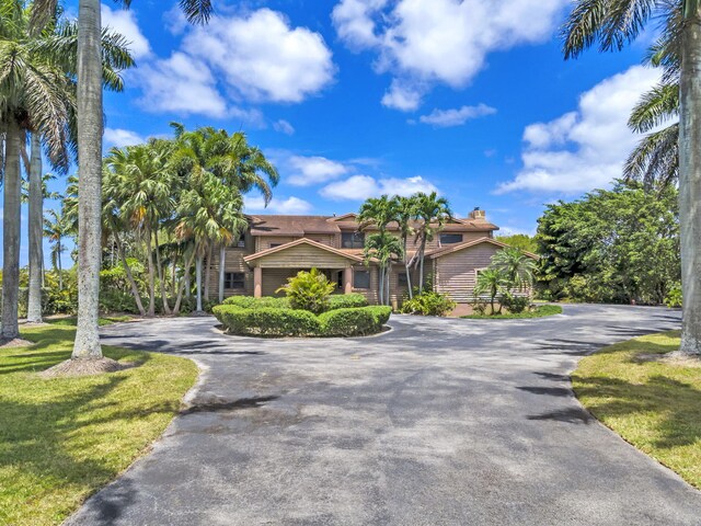 view of front of home with a front yard