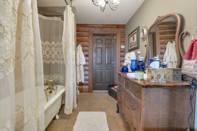 bathroom featuring vanity, shower / tub combo, and log walls