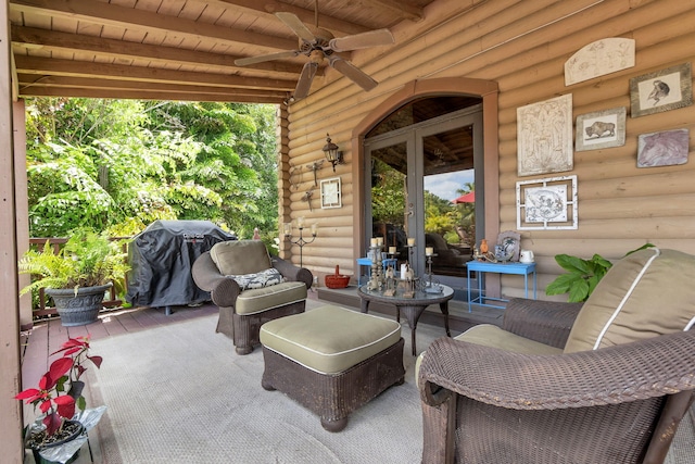 view of patio with grilling area and ceiling fan