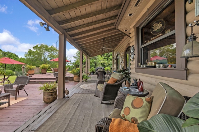 wooden terrace with ceiling fan