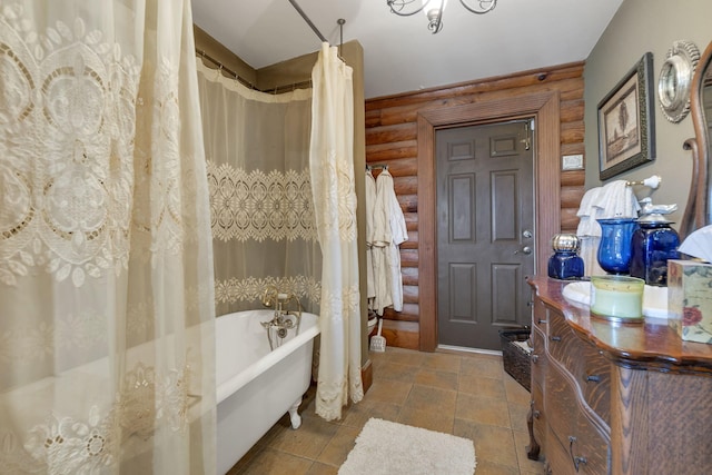 bathroom featuring vanity and shower / bathtub combination with curtain