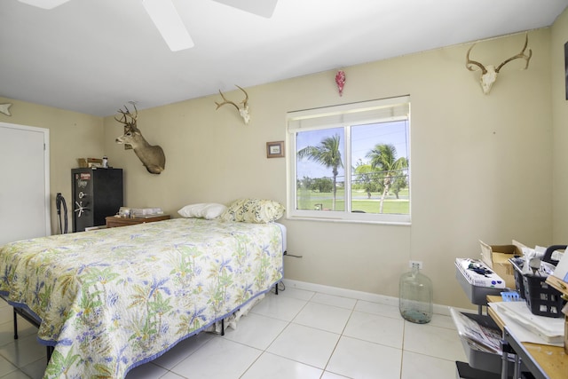 bedroom featuring light tile patterned floors