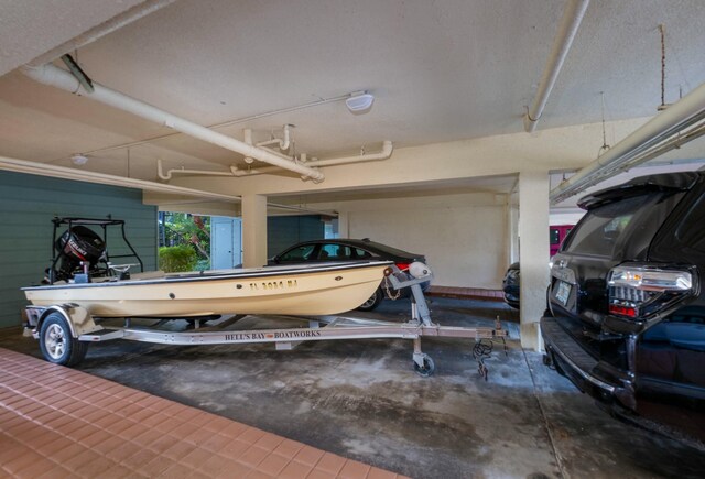 garage featuring a carport