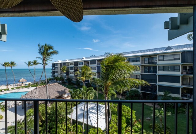 balcony featuring a water view