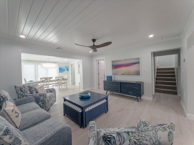 living room with crown molding, light hardwood / wood-style floors, wooden ceiling, and ceiling fan