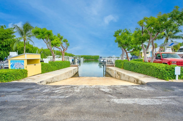 dock area with a water view