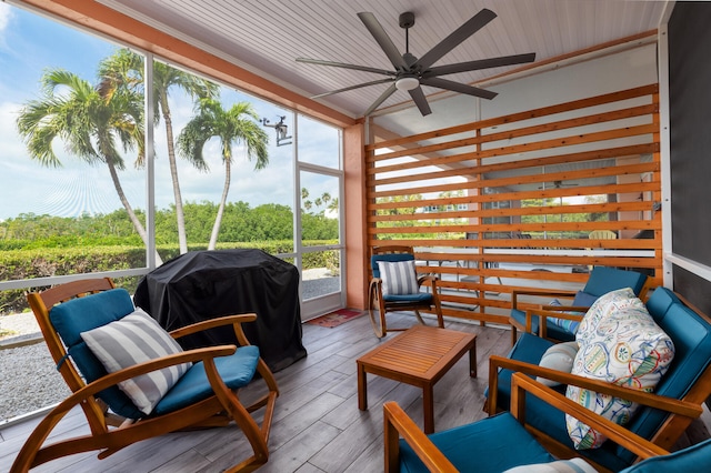 sunroom / solarium with ceiling fan