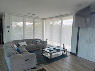 44 S Blackwater Ln, Key Largo, FL 33037 - living room featuring wood finished floors