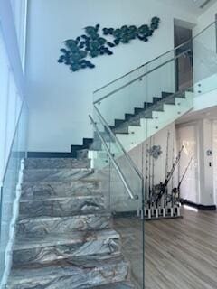 44 S Blackwater Ln, Key Largo, FL 33037 - stairs with wood finished floors and a towering ceiling