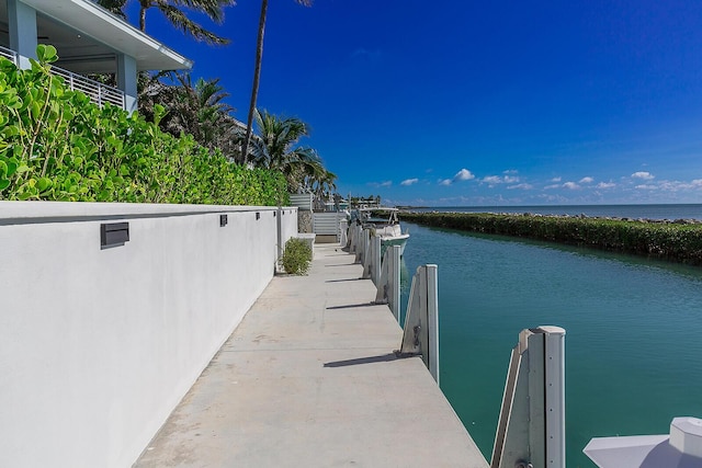 dock area with a water view