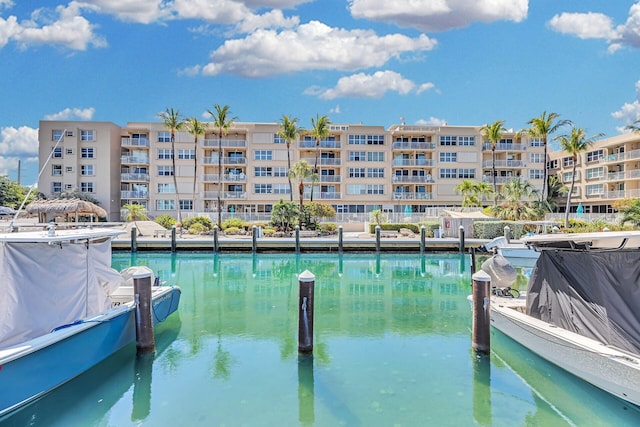 view of swimming pool featuring a dock