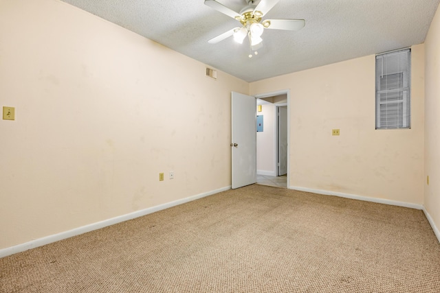 3930 S Roosevelt Blvd Unit N302, Key West, FL 33040 - carpeted empty room featuring a ceiling fan, a textured ceiling, and baseboards