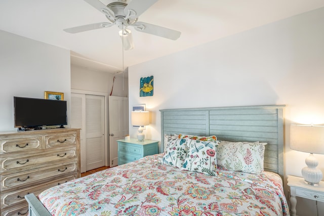 bedroom featuring ceiling fan and a closet