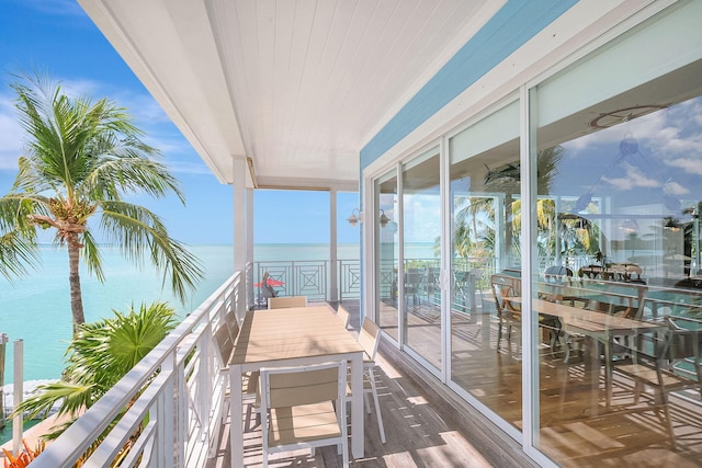 balcony featuring a water view