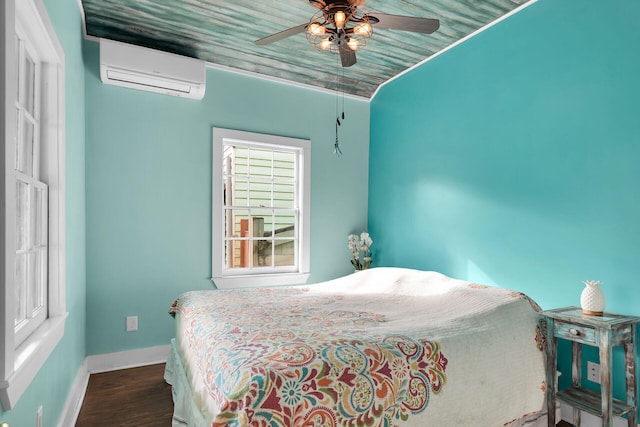 bedroom featuring ceiling fan, wood finished floors, wood ceiling, baseboards, and an AC wall unit