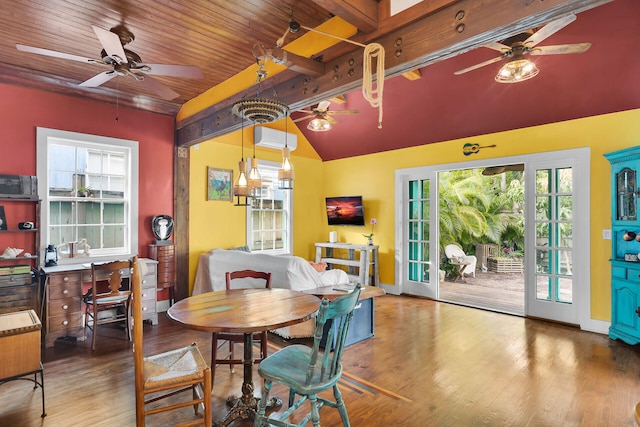dining room featuring ceiling fan, lofted ceiling, wood finished floors, baseboards, and wood ceiling