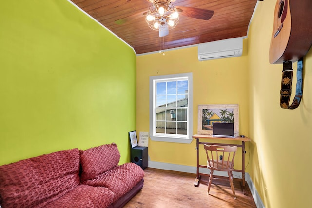 living area with wood ceiling, ceiling fan, wood finished floors, a wall mounted air conditioner, and baseboards