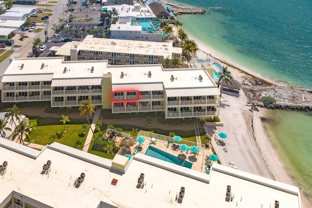 aerial view featuring a view of the beach and a water view