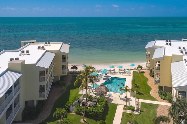 aerial view featuring a view of the beach and a water view