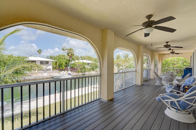 wooden deck with ceiling fan