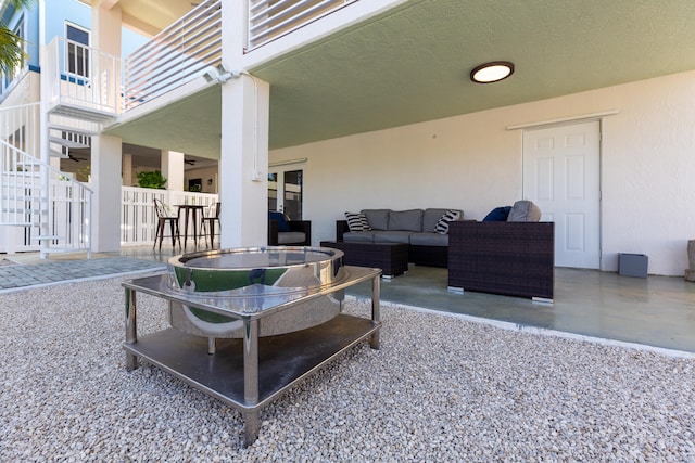 view of patio / terrace featuring an outdoor hangout area and a balcony