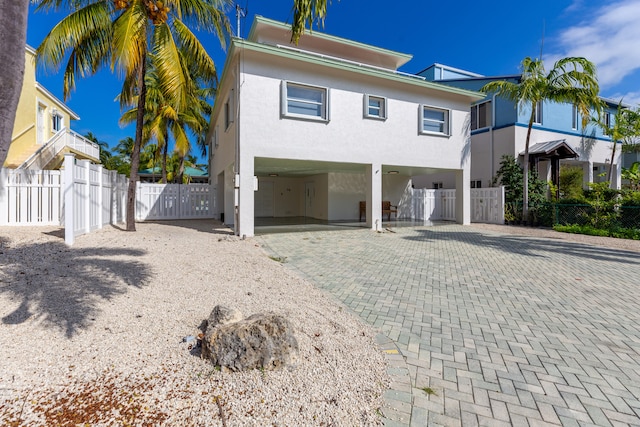 view of front of home featuring a carport