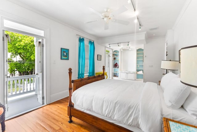 bedroom with access to exterior, ceiling fan, crown molding, track lighting, and light wood-type flooring