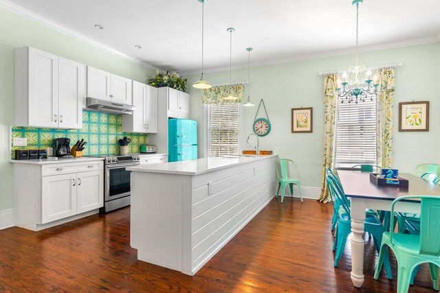 kitchen featuring white cabinetry, stainless steel range with electric stovetop, decorative light fixtures, refrigerator, and dark hardwood / wood-style floors