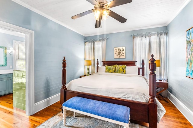 bedroom with ceiling fan, ornamental molding, and light hardwood / wood-style floors