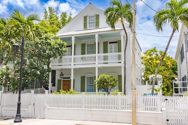 view of front of home with a balcony and covered porch