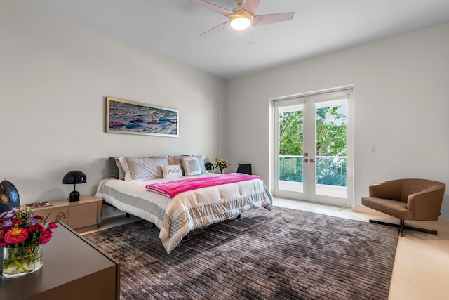 bedroom with access to outside, french doors, and ceiling fan